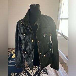 J. Crew medium sized olive green jacket with golden zips and buckles